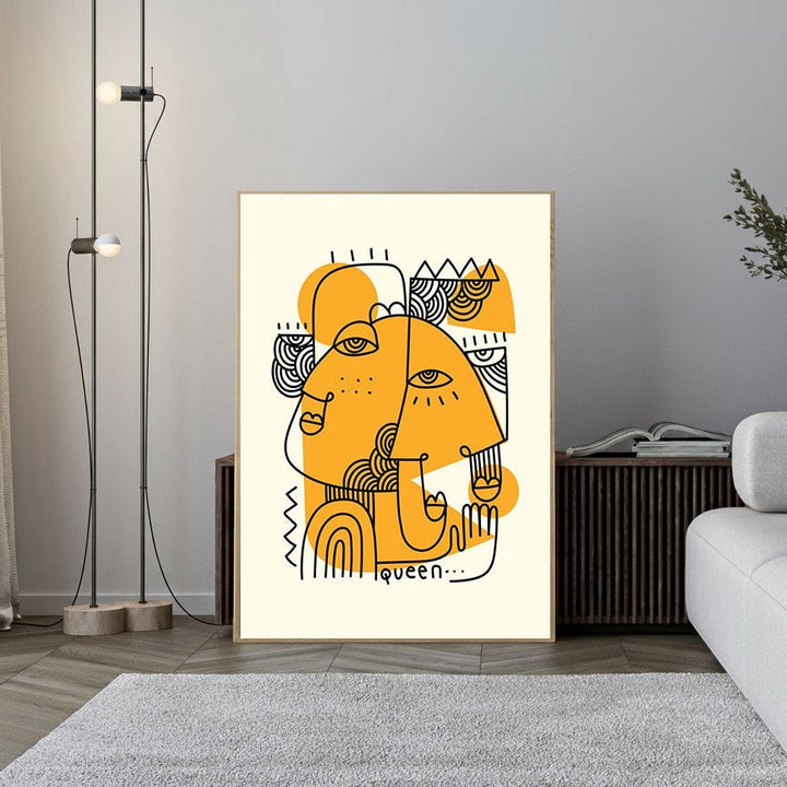 Wadi Home Abstract Face Duo Wall Art, yellow and black minimalist line art print featuring two intertwined faces.