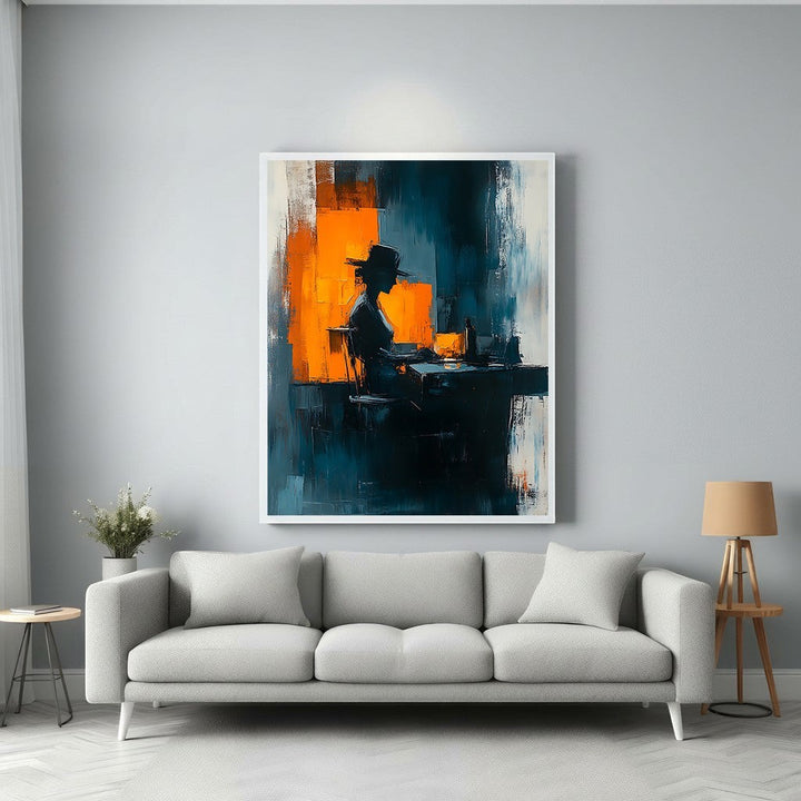 Wadi Home abstract wall art of a figure in a hat at a desk, with bold strokes of deep blue, orange, and white.