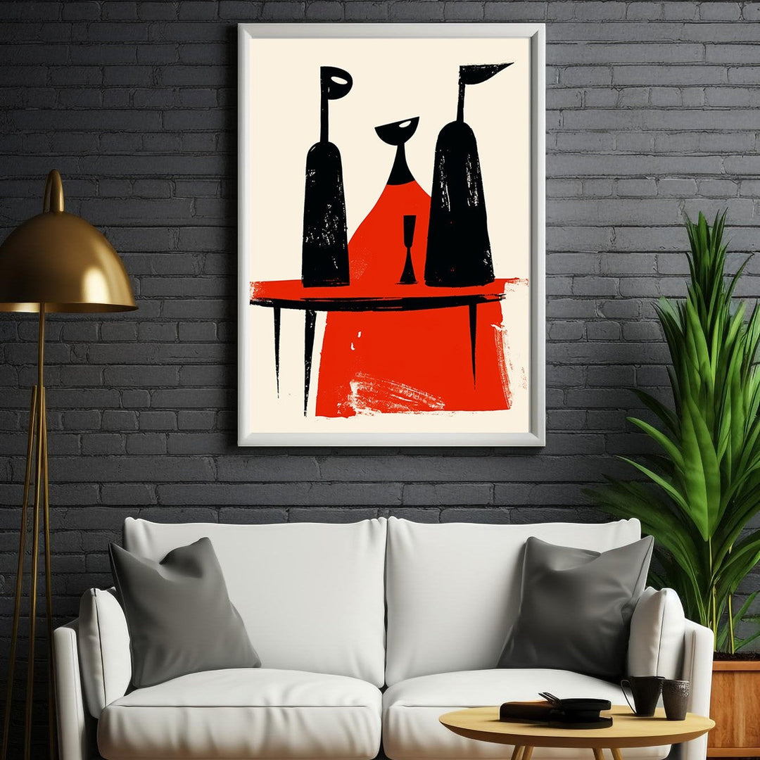 Wadi Home abstract wall art with black figures on a red table against a cream background, framed in white.