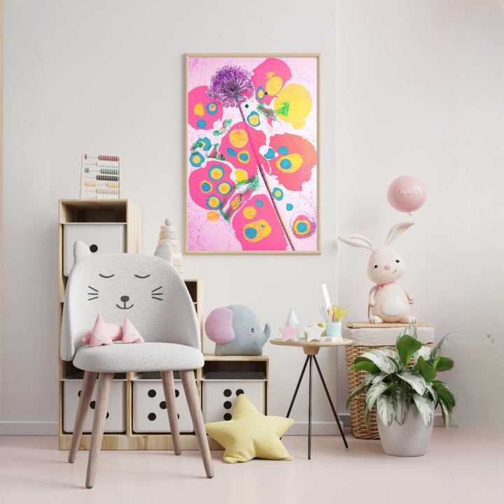 Wadi Home abstract floral art with pink, yellow, and blue hues. Framed print on a light pink background with a purple flower.