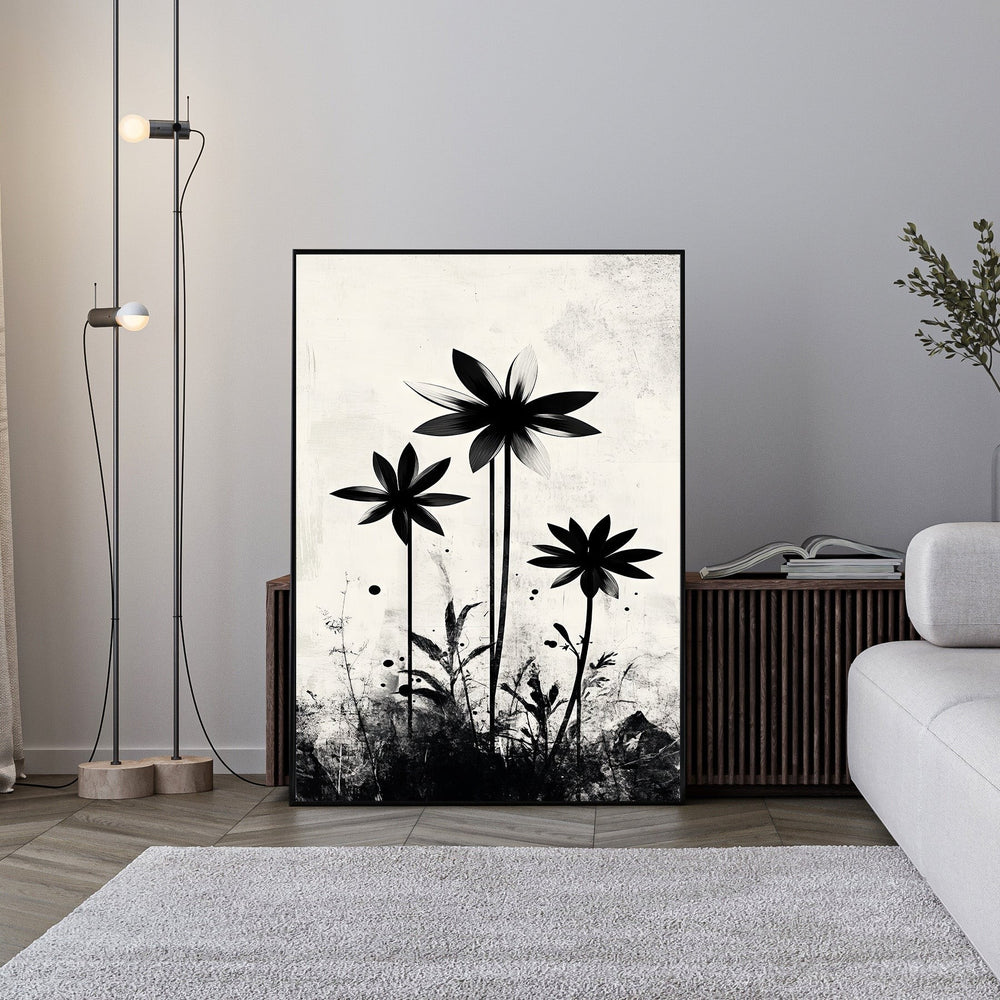 Wadi Home abstract floral silhouette wall art in black and white, featuring graphic flowers on a textured neutral background.