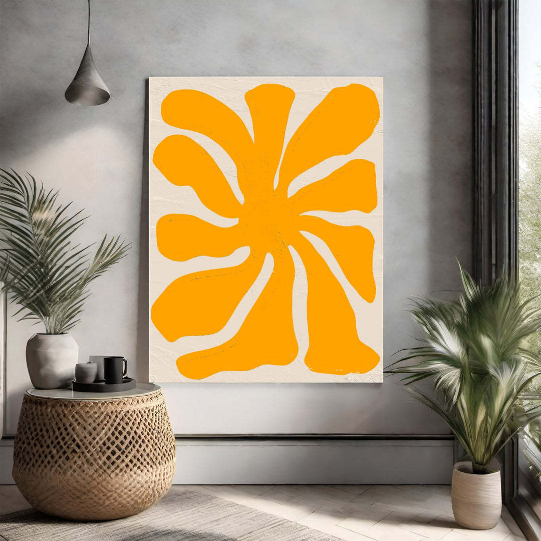 Wadi Home Abstract Floral Burst Wall Art: Vibrant sun-yellow abstract floral design on a neutral textured background.