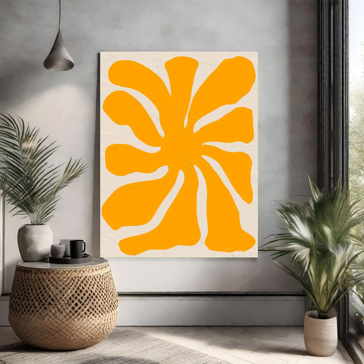 Wadi Home Abstract Floral Burst Wall Art: Vibrant sun-yellow abstract floral design on a neutral textured background.