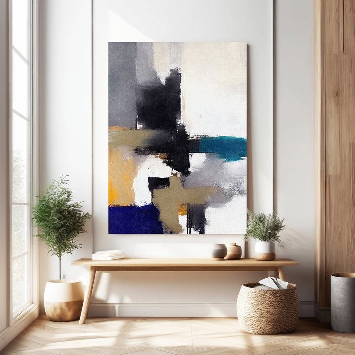 Wadi Home abstract geometric canvas wall art with blues, yellows, grays, and black. Modern textured design.