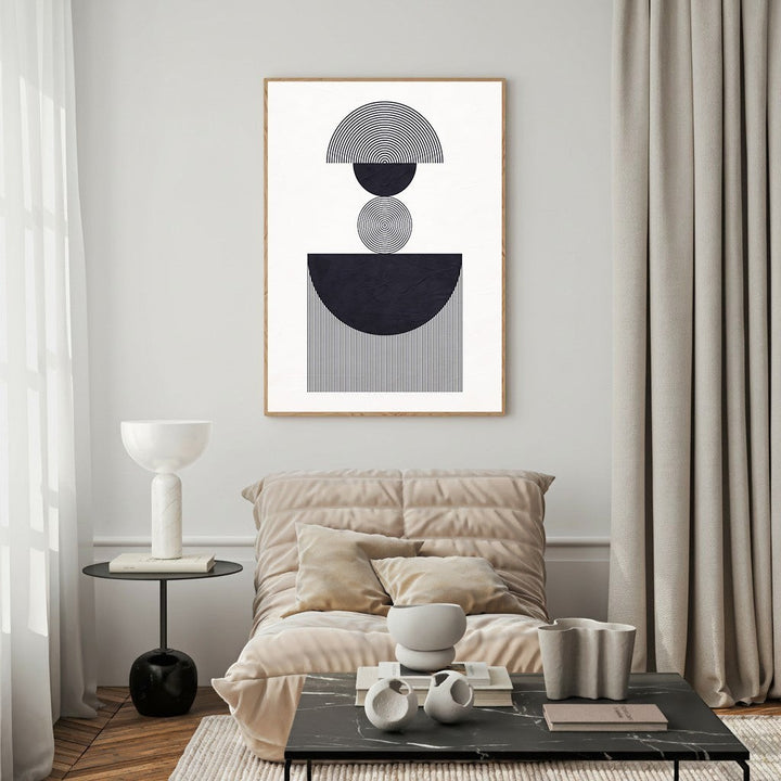 Wadi Home abstract geometric wall art in black and white, featuring stacked semi-circles and lines, framed in wood.