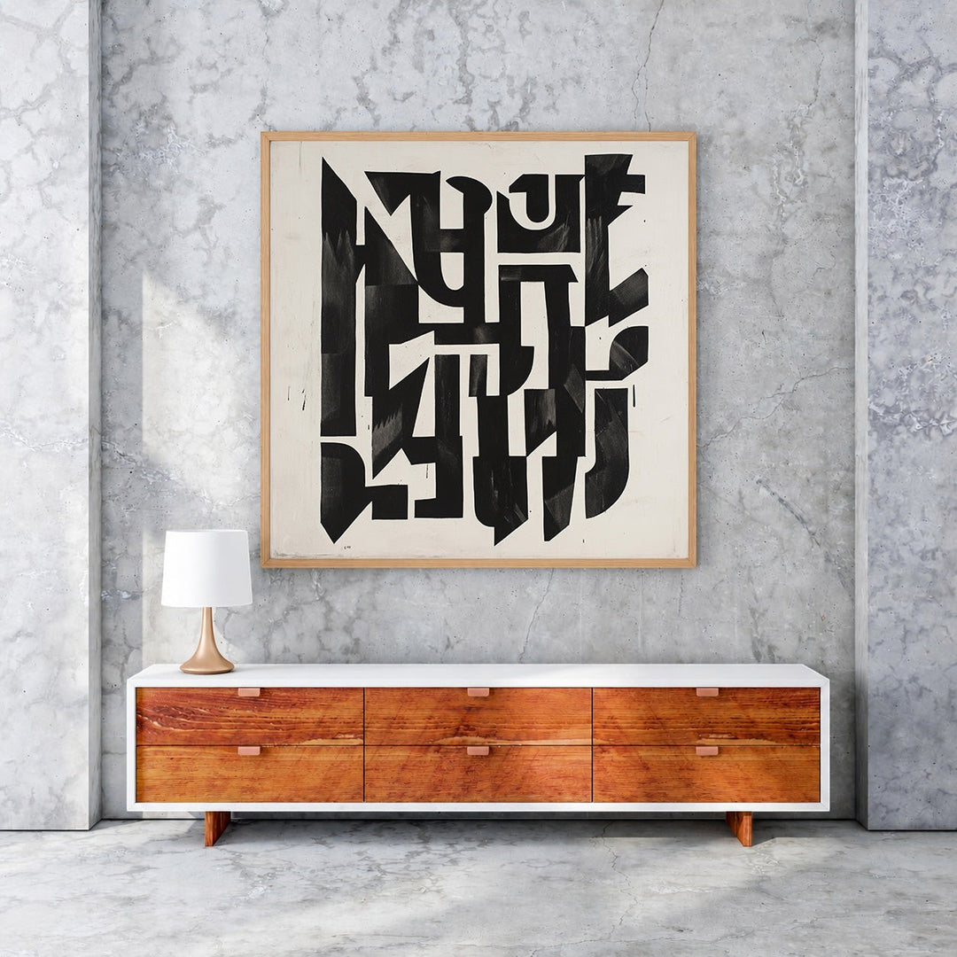 Wadi Home abstract monochrome geometric wall art with bold shapes and sharp lines in a wooden frame.