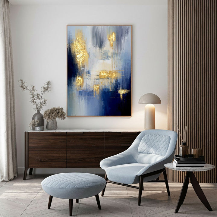 Wadi Home abstract canvas wall art with deep blues and shimmering gold leaf accents, modern luxury design.