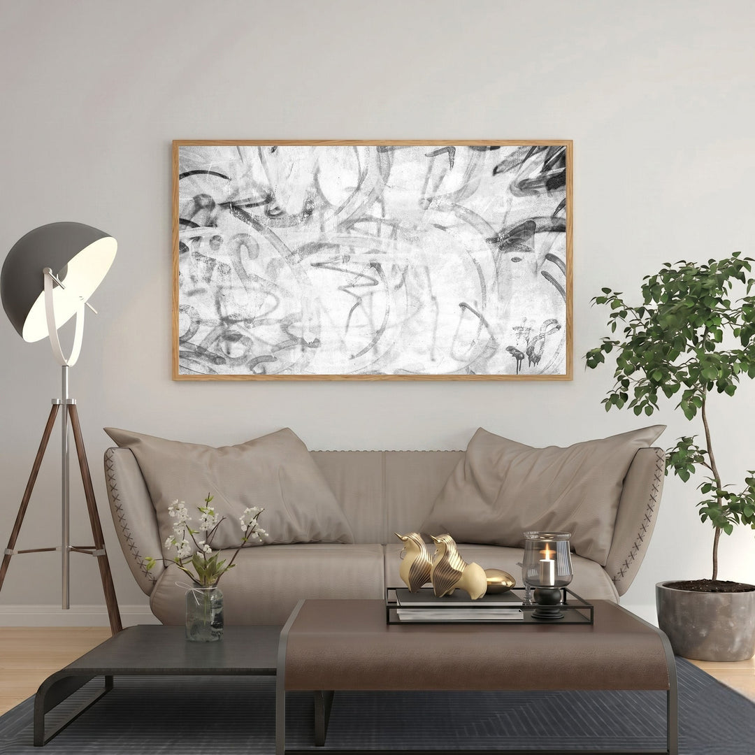 Wadi Home abstract monochrome graffiti wall art with bold lines and textured details in a modern living room.