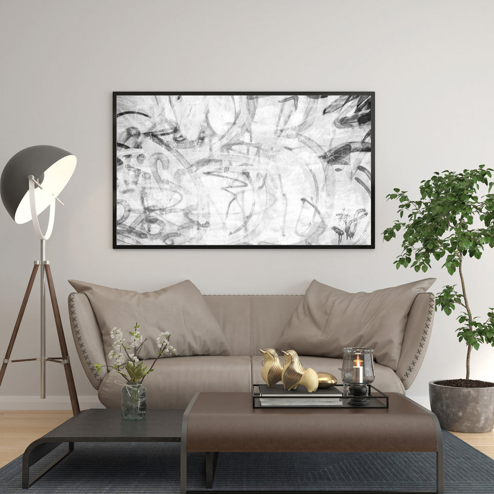 Wadi Home abstract monochrome graffiti wall art with bold lines and textured details, framed in black.