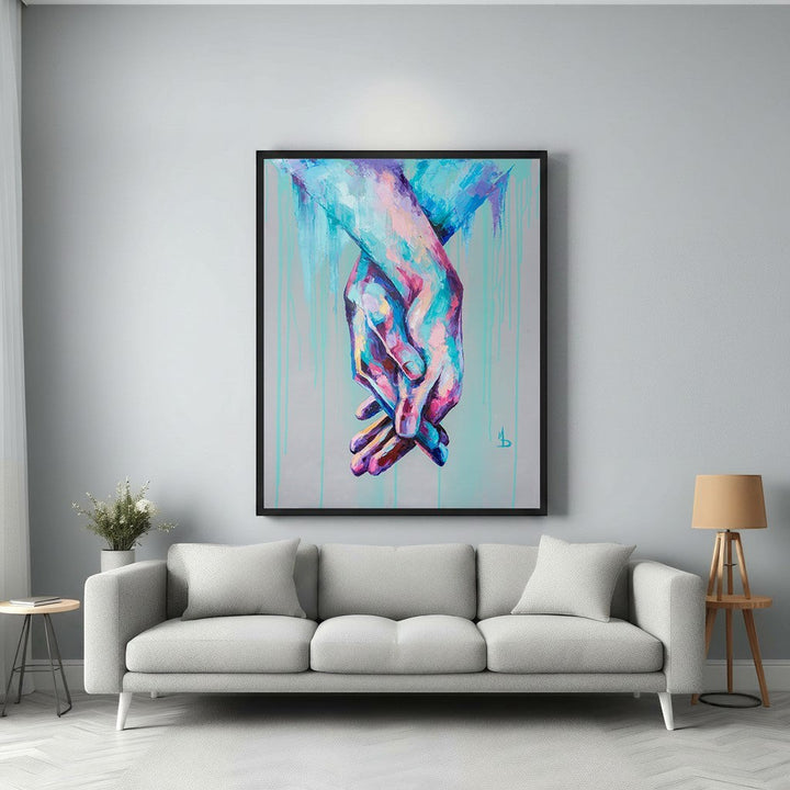 Wadi Home abstract canvas wall art of intertwined hands in vibrant blues, pinks, and purples with dripping paint effect.