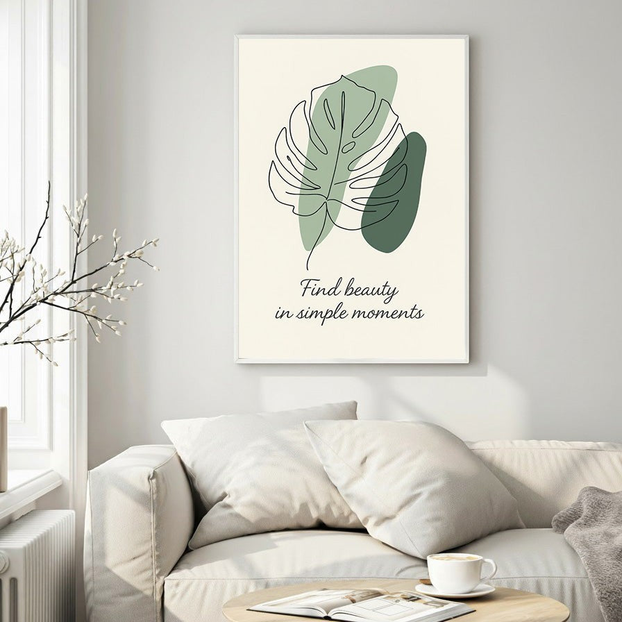 Wadi Home framed wall art with abstract monstera leaf line art, sage green shapes, and quote 'Find beauty in simple moments'.