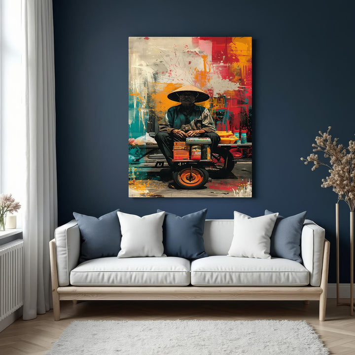 Wadi Home abstract canvas print of a man in a conical hat, with a vibrant red, yellow, and blue background. Expressive brushstrokes.