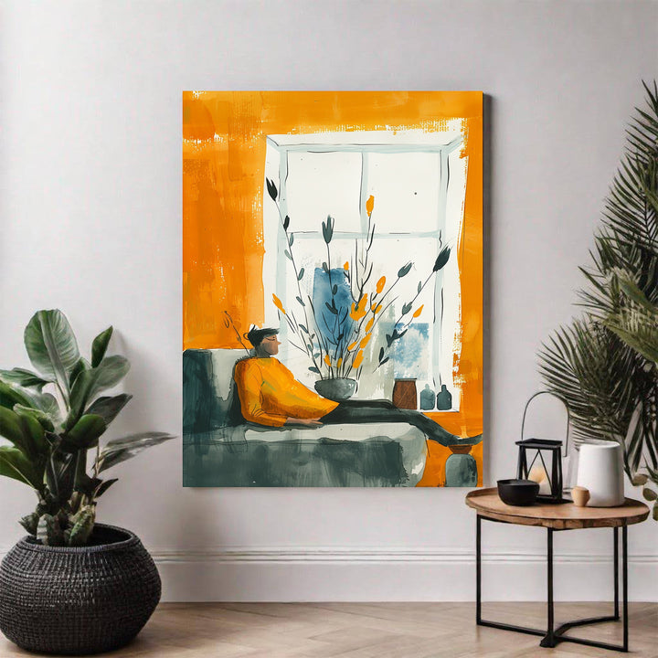 Wadi Home abstract wall art of a person in a yellow sweater relaxing on a sofa, with a window and plants. Orange, blue, and grey tones.