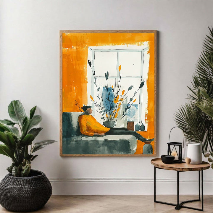 Wadi Home abstract wall art print of a person in an orange sweater relaxing on a sofa, with a window and plants. Vibrant orange and blue tones.