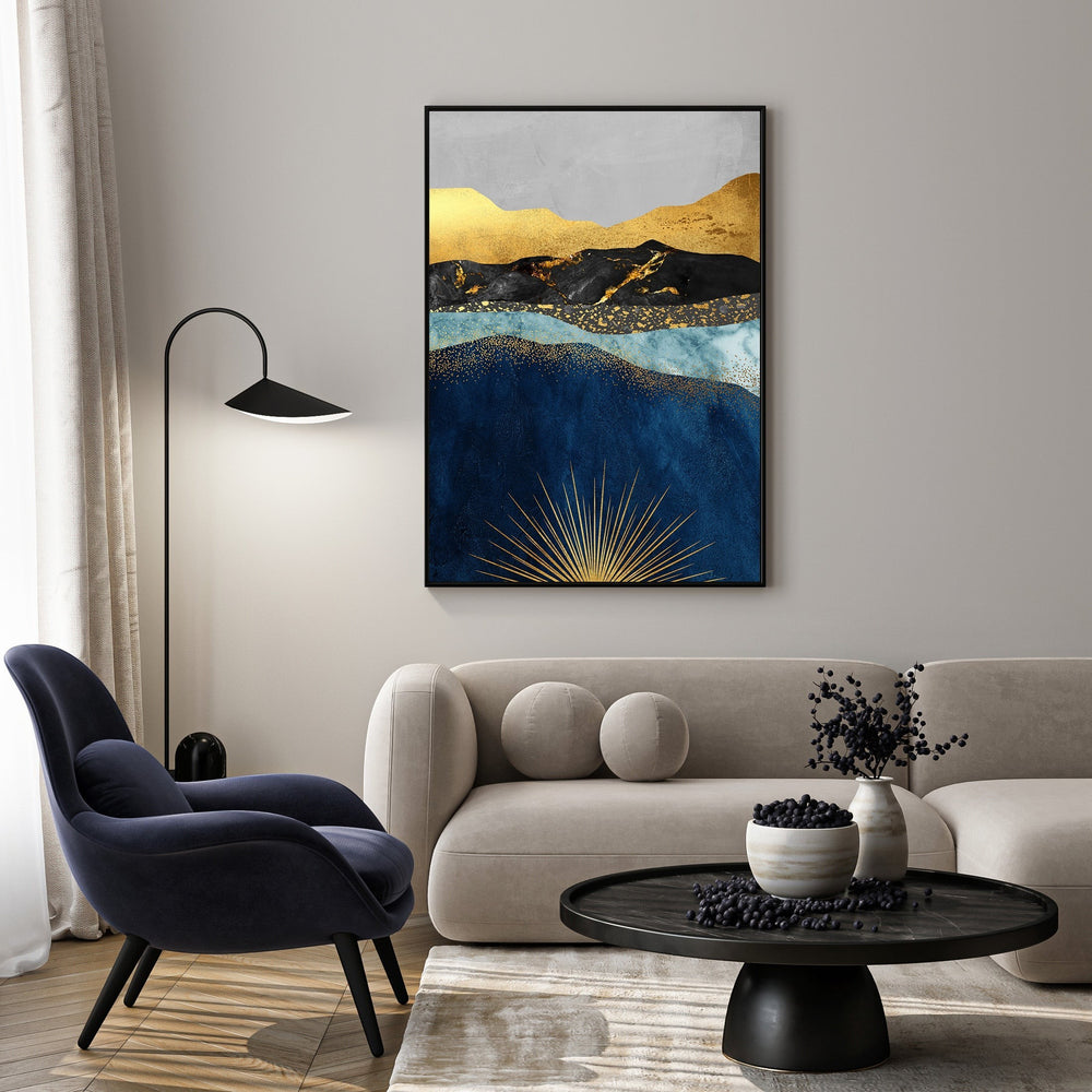 Wadi Home abstract mountain landscape wall art with deep blues, gold, and grays, featuring a sunburst motif.