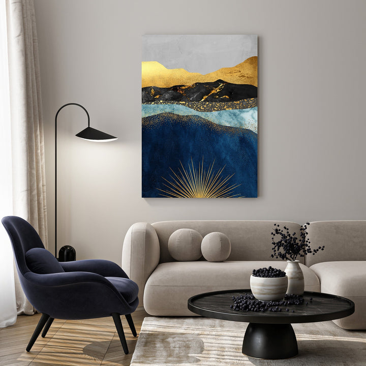 Wadi Home abstract mountain landscape wall art with deep blues, gold, and grays. Features a sunburst design.