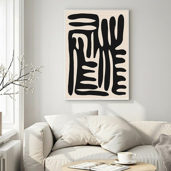 Wadi Home abstract black organic shapes wall art on textured cream background, modern minimalist aesthetic.