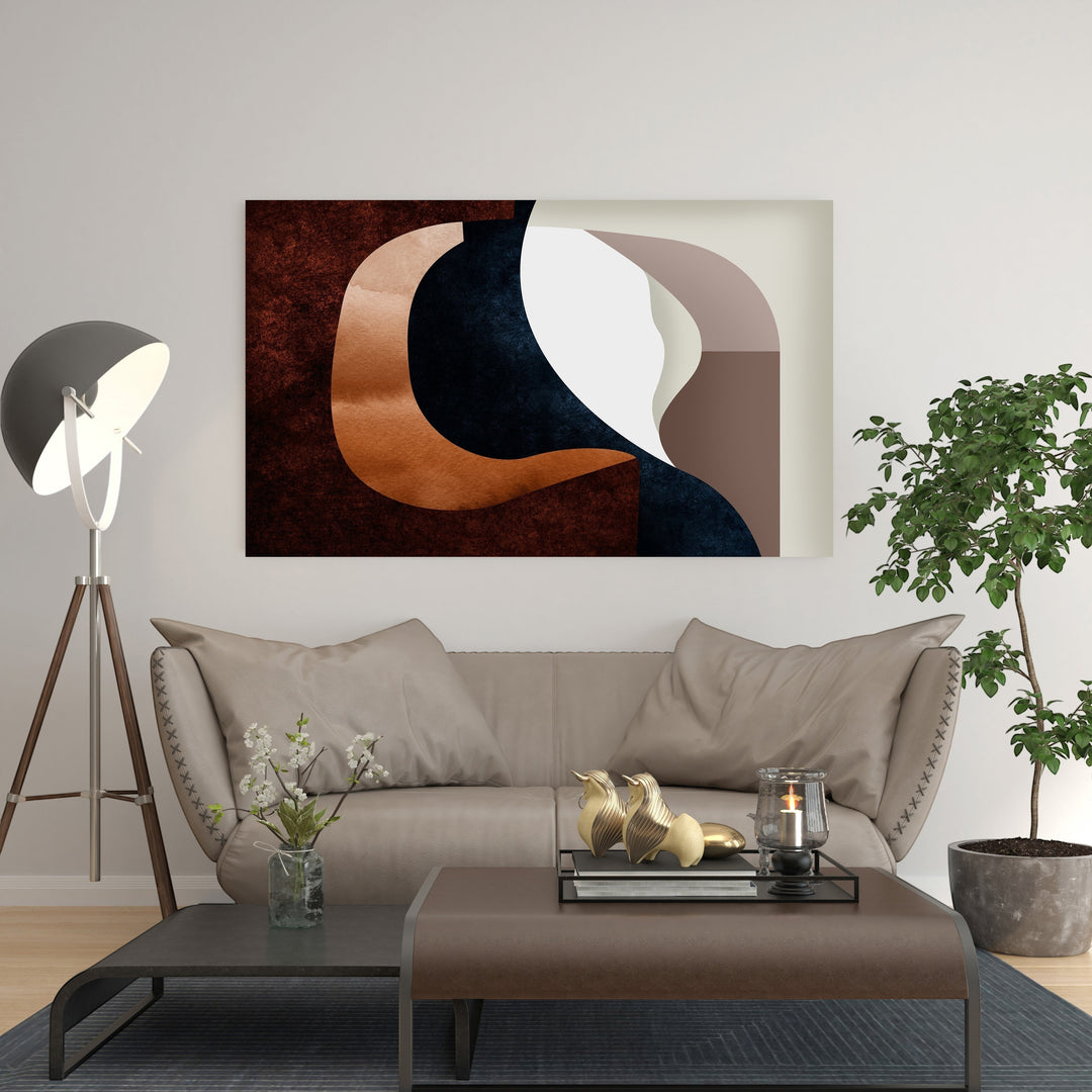 Wadi Home abstract organic shapes wall art in deep blues, browns, and copper tones, adding modern elegance to a living room.