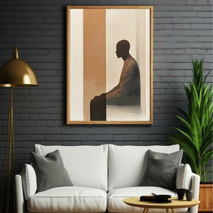Wadi Home abstract silhouette portrait wall art featuring a seated figure in neutral tones, framed in wood.