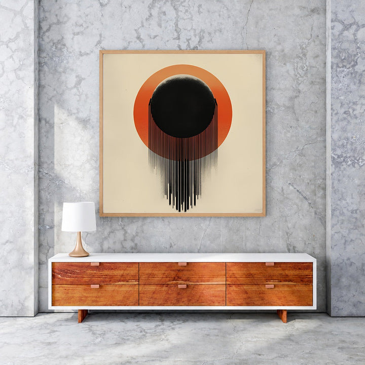 Wadi Home Abstract Sunburst Wall Art with black orb and orange sunburst design, dripping effect.