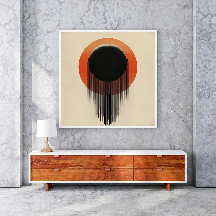 Wadi Home Abstract Sunburst Wall Art with black orb and orange sunburst design, dripping effect.