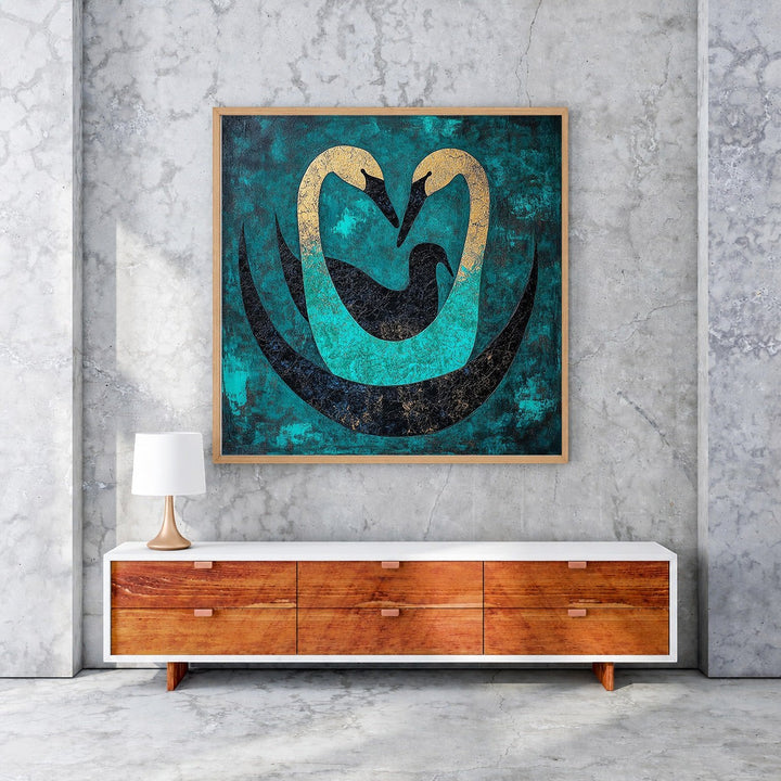Wadi Home Abstract Swan Embrace Wall Art with teal, black, and gold swans forming a heart shape. Textured finish.