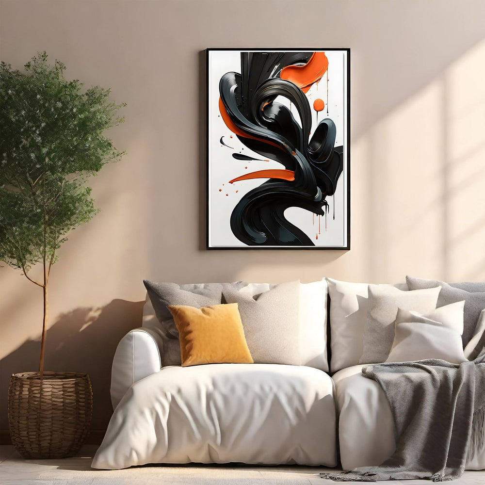 Wadi Home abstract wall art with glossy black and orange swirls, framed in black.