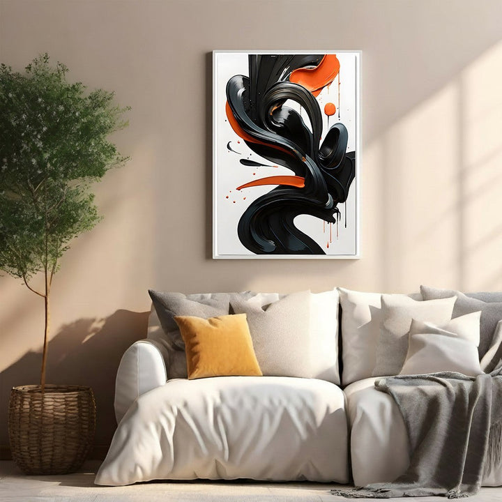 Wadi Home abstract wall art with glossy black swirls and orange accents on a white background, framed.