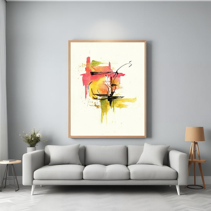 Wadi Home abstract watercolor wall art with red, yellow, green splashes and black lines, framed in light wood.