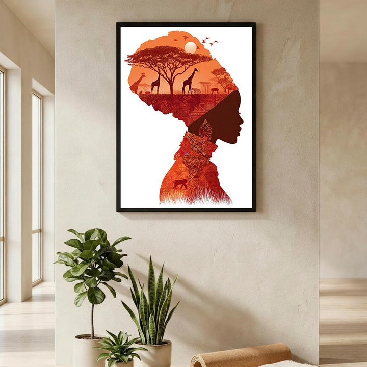 Wadi Home African silhouette wall art with woman's profile filled with savanna sunset, giraffes, zebras, and trees.