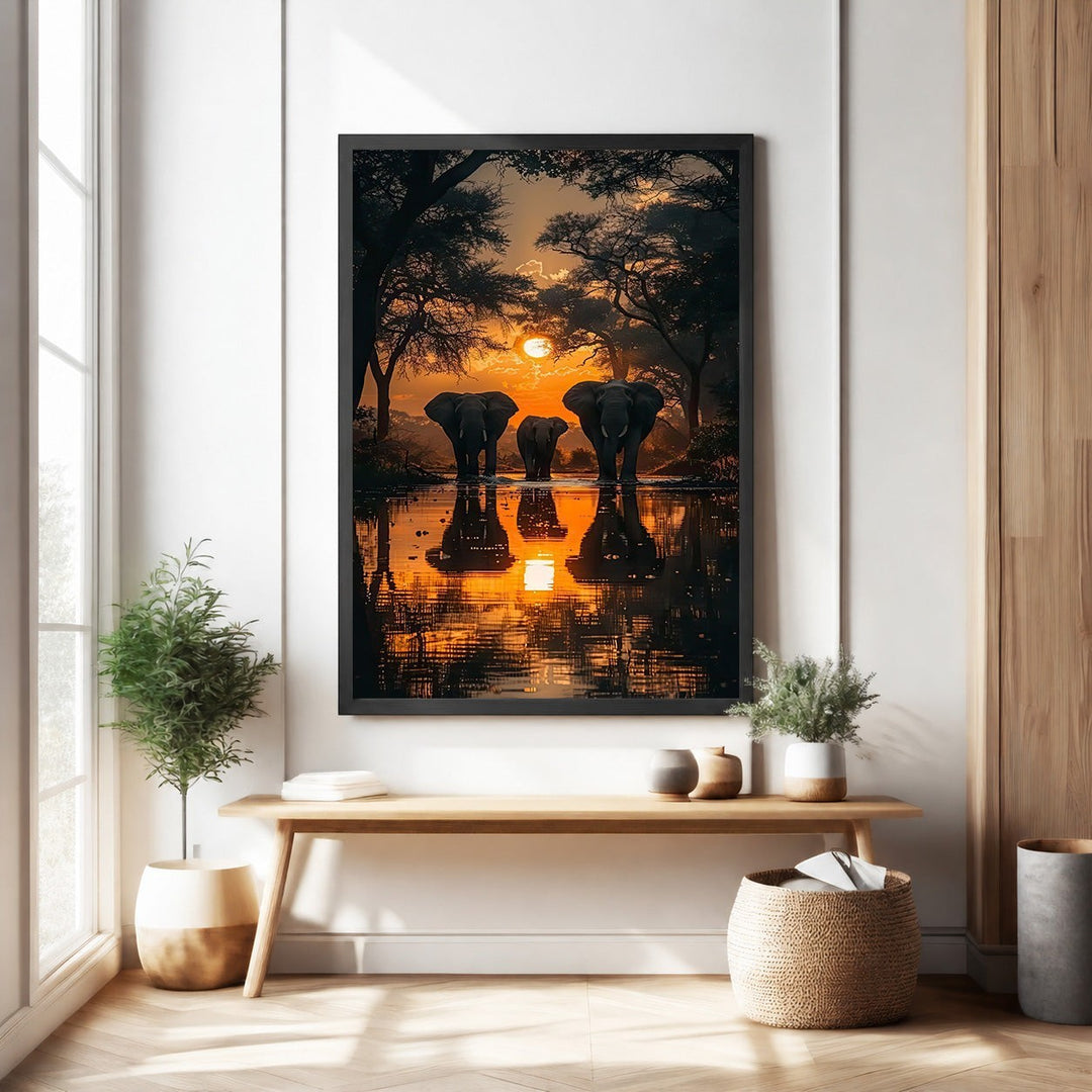 Wadi Home African Sunset Elephant Gathering wall art featuring a herd of elephants at sunset reflected in water.