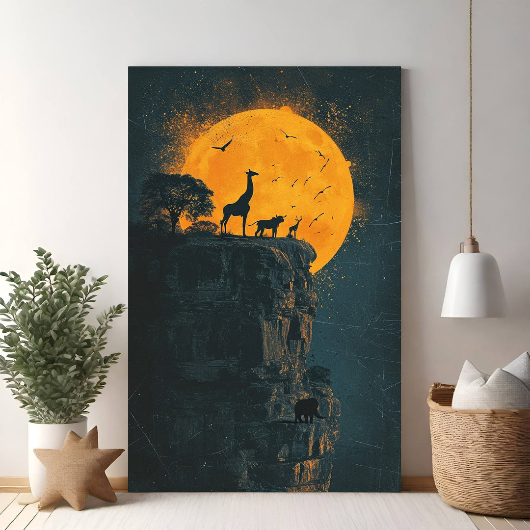 Wadi Home African Wildlife Sunset Silhouette Wall Art featuring giraffes, antelopes, and a bear on a cliff against a large orange moon.