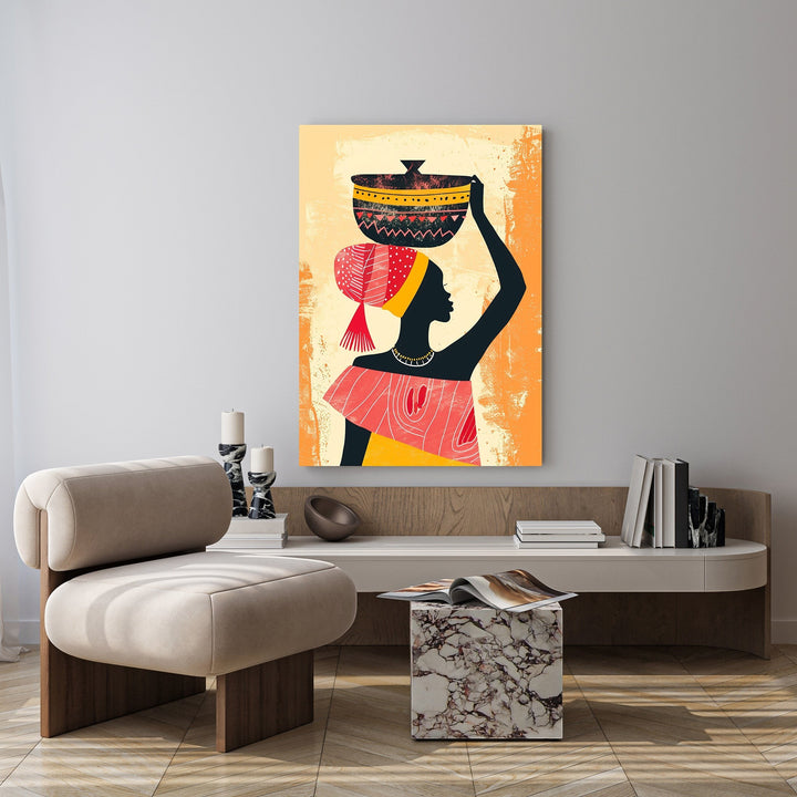 Wadi Home African woman carrying a basket wall art, silhouette in red, yellow, and black against textured orange background.