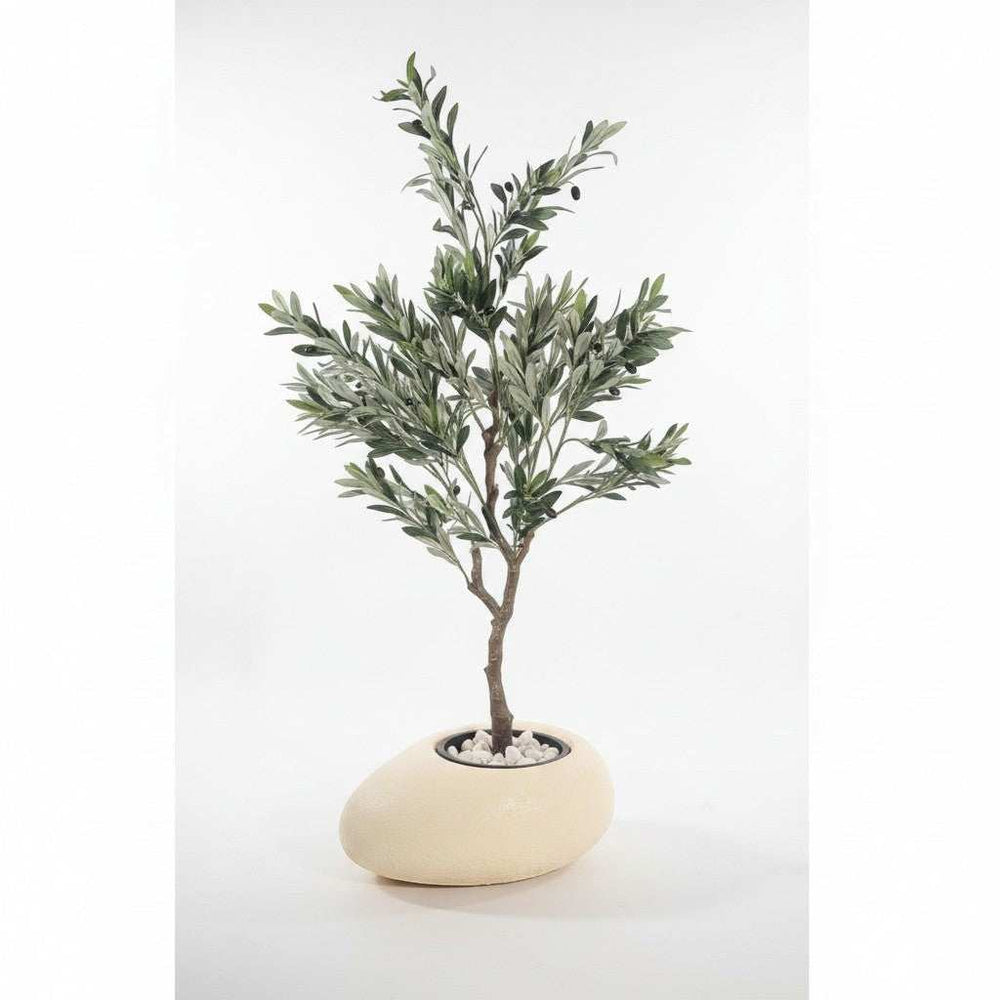 Wadi Home artificial olive tree with green leaves and olives in a stone-effect pot with white pebbles.