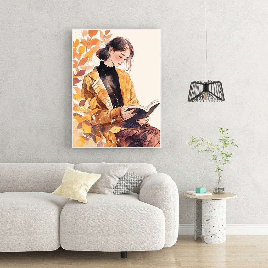 Wadi Home watercolor art of a woman in a yellow plaid jacket reading a book, surrounded by autumn leaves.