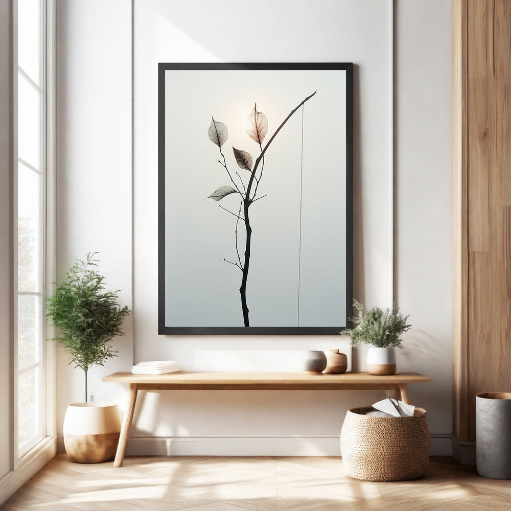 Wadi Home Delicate Branch Botanical Art print with translucent leaves in a black frame, minimalist nature decor.