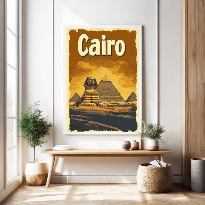 Wadi Home vintage travel poster of Cairo featuring the Pyramids and Sphinx in sepia tones.