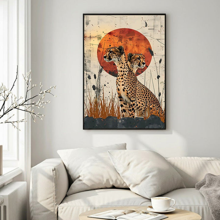 Wadi Home framed wall art print of two cheetahs silhouetted against a textured orange sunset on the savannah.