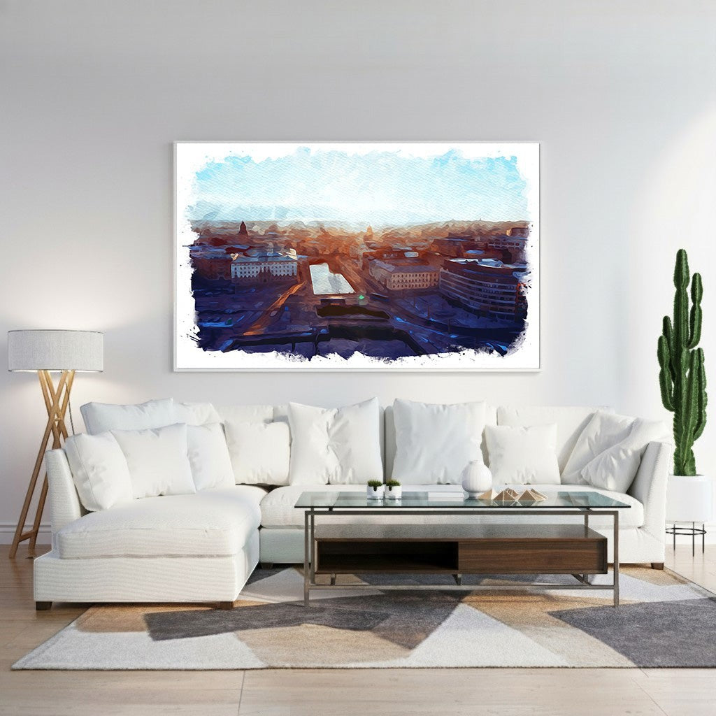 Wadi Home Cityscape Sunrise Watercolor Wall Art featuring a vibrant watercolor depiction of a city at dawn with warm oranges and deep blues.