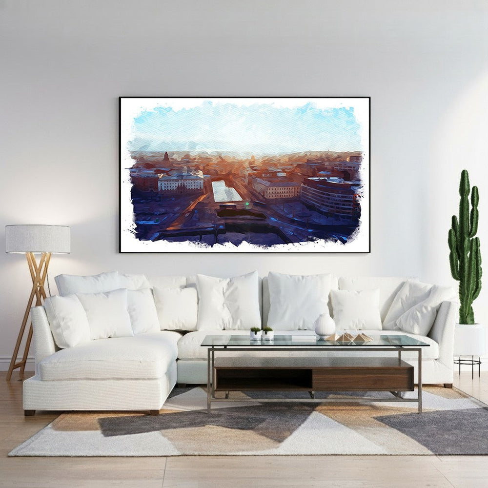 Wadi Home Cityscape Sunrise Watercolor Wall Art featuring a vibrant watercolor depiction of a city at dawn with warm oranges and deep blues.