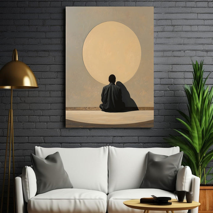 Wadi Home couple sitting under a large moon wall art, minimalist design, muted colors, romantic atmosphere.