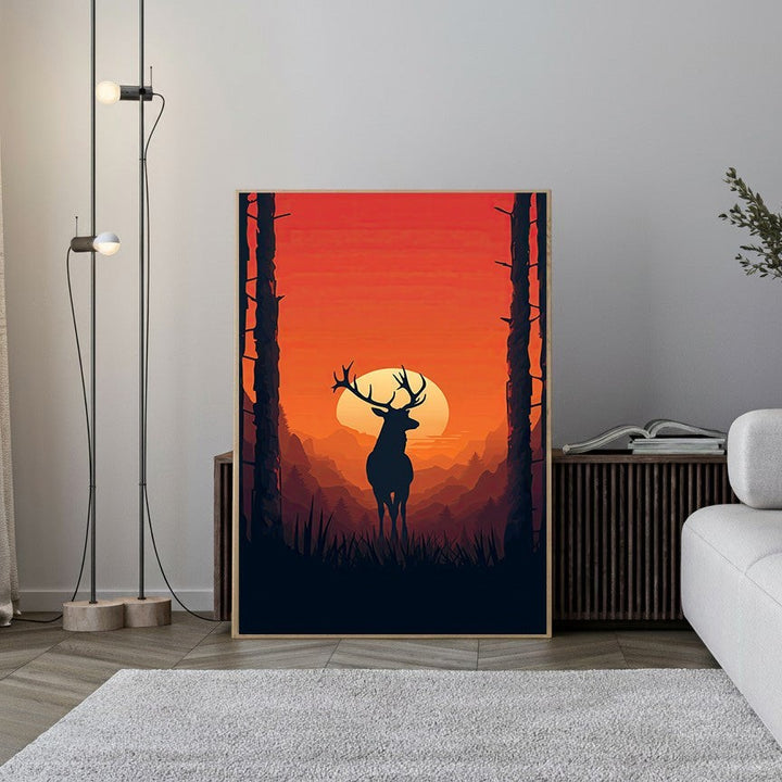 Wadi Home majestic deer silhouette wall art in a forest landscape at sunset. Minimalist design with rich orange and dark blue colors.
