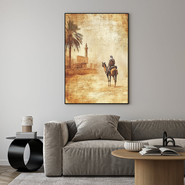 Wadi Home desert caravan wall art with sepia tones, featuring a person on horseback, palm tree, and minaret.