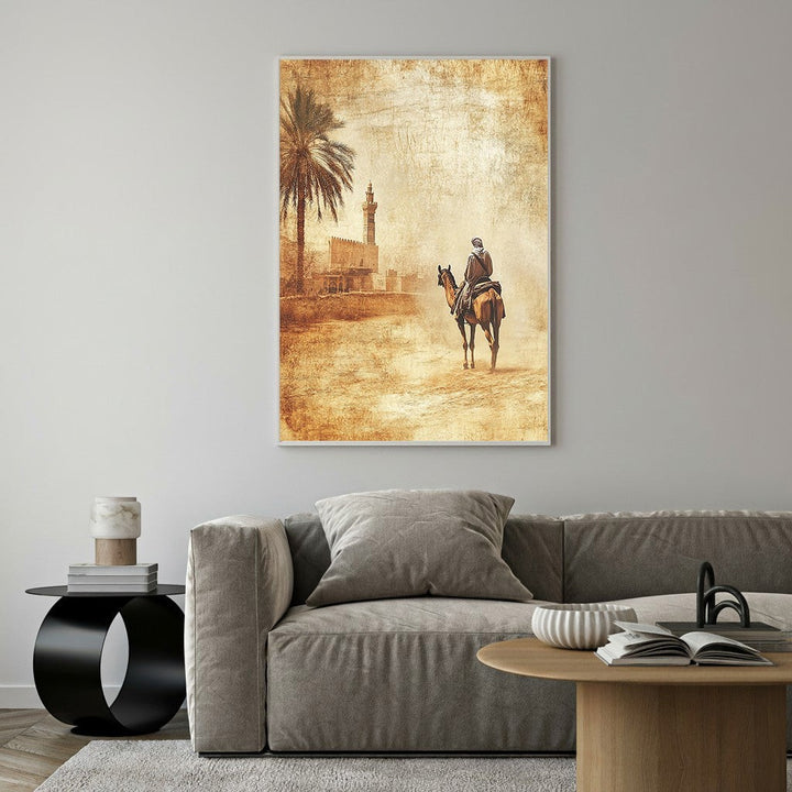 Wadi Home desert caravan wall art with sepia tones, featuring a person on horseback, palm tree, and minaret.