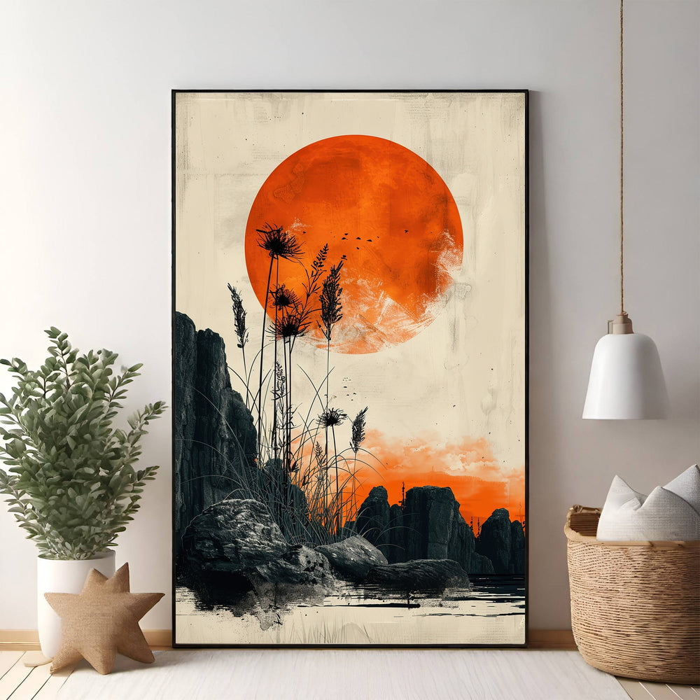 Wadi Home dramatic sunset wall art with vibrant orange sun over rocky landscape and silhouetted reeds.