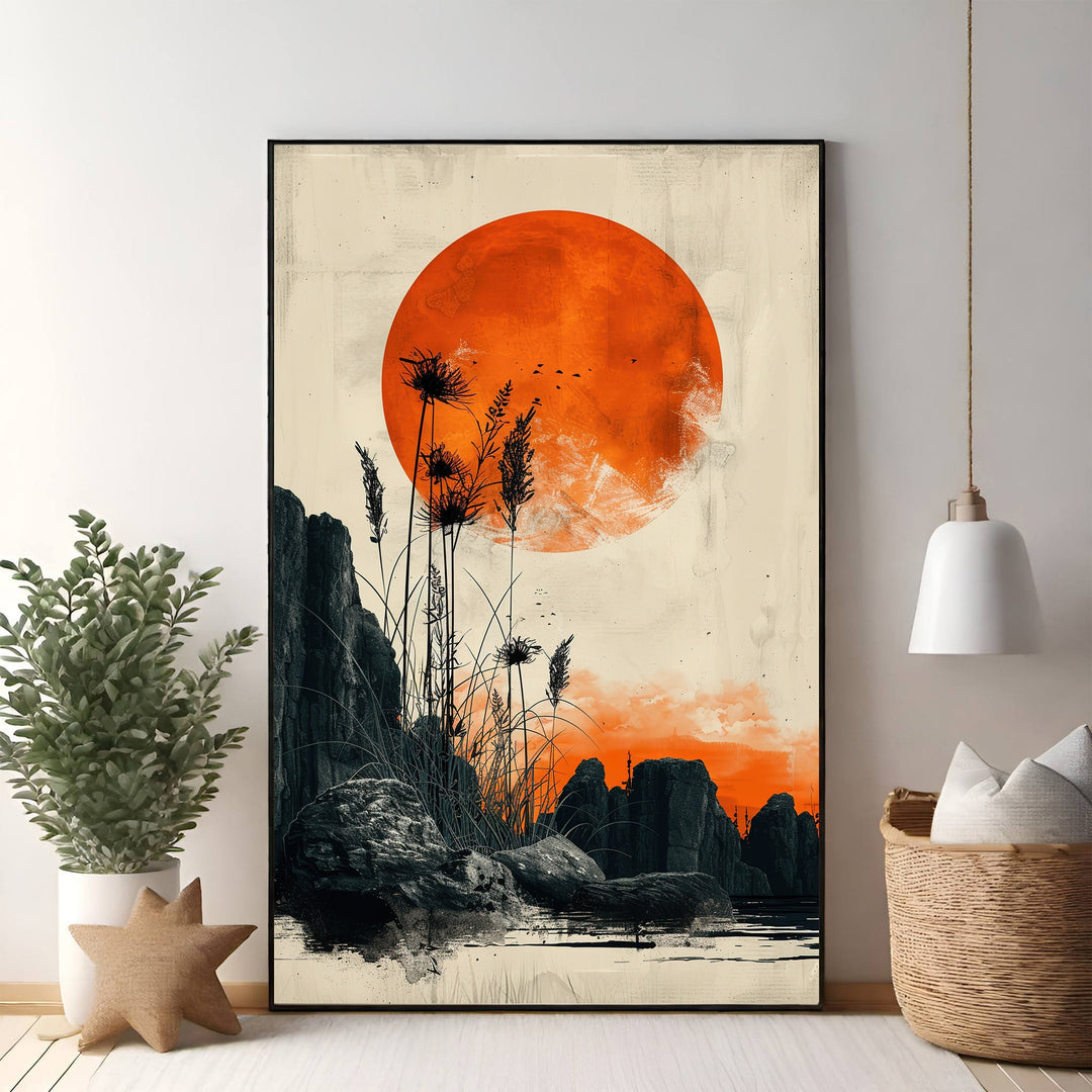 Wadi Home dramatic sunset wall art with vibrant orange sun over rocky landscape and silhouetted reeds.