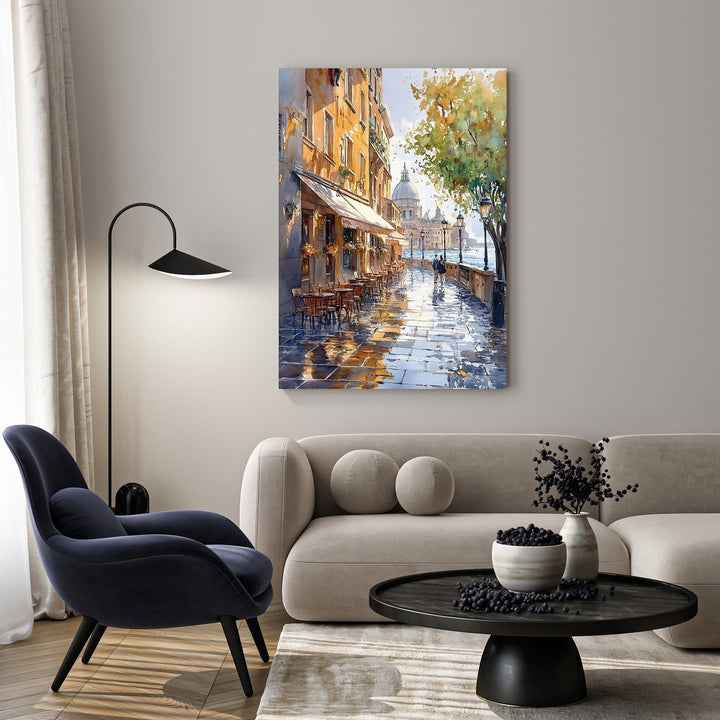 Wadi Home European city street scene watercolor painting with cafe and cobblestones. Warm hues and soft brushstrokes.