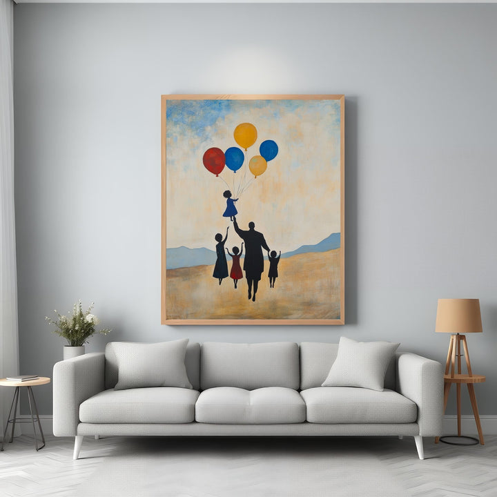 Wadi Home Family With Balloons wall art, silhouette of family holding balloons, one child lifted by balloons, landscape background.