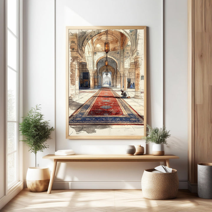 Wadi Home Islamic mosque hallway art print, watercolor style, featuring arches, lanterns, and a red carpet runner with a person praying.