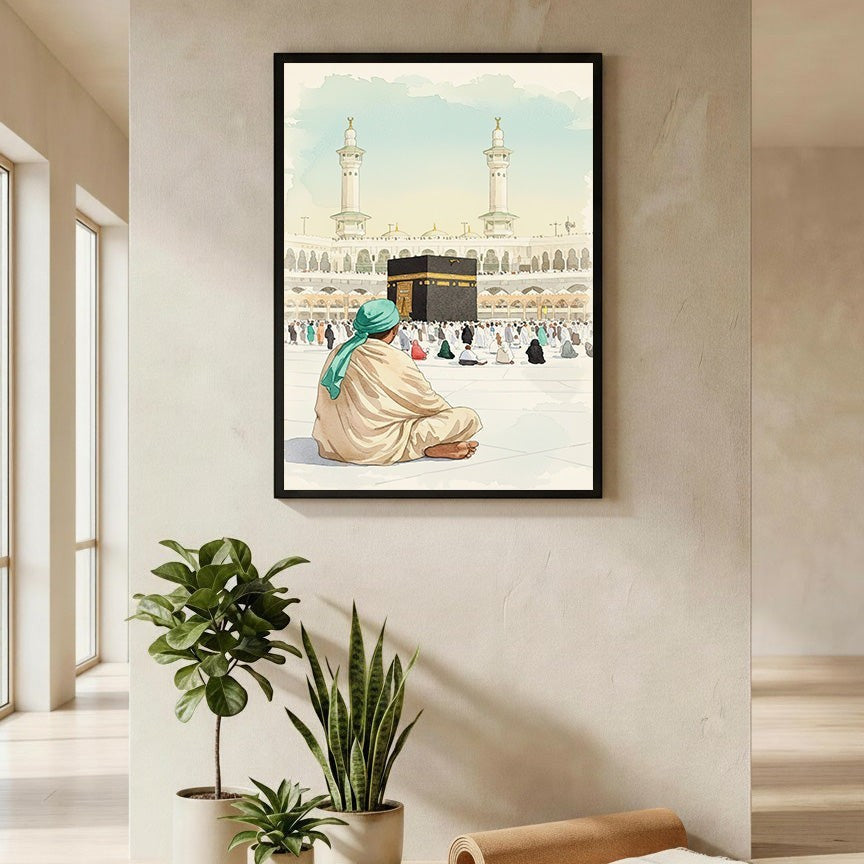 Wadi Home Islamic pilgrimage artwork depicting the Kaaba and pilgrims in a watercolor style. A person in a turban sits facing the Kaaba.
